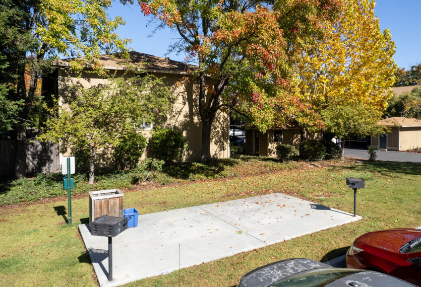 BBQ area near grass and parking