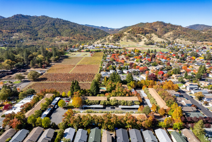 Ariel view of community and city skyline