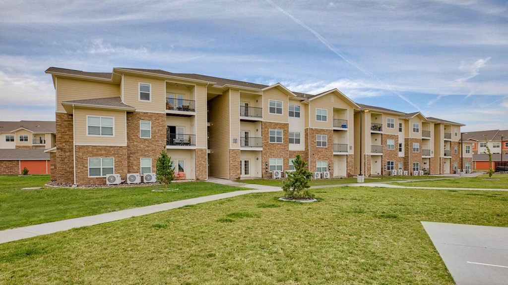 Exterior community buildings with grass
