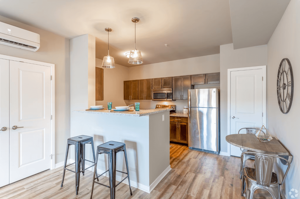 kitchen with bar and barstools