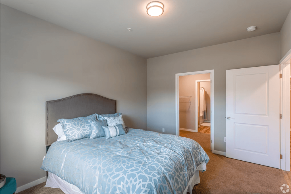 large bedroom with bed