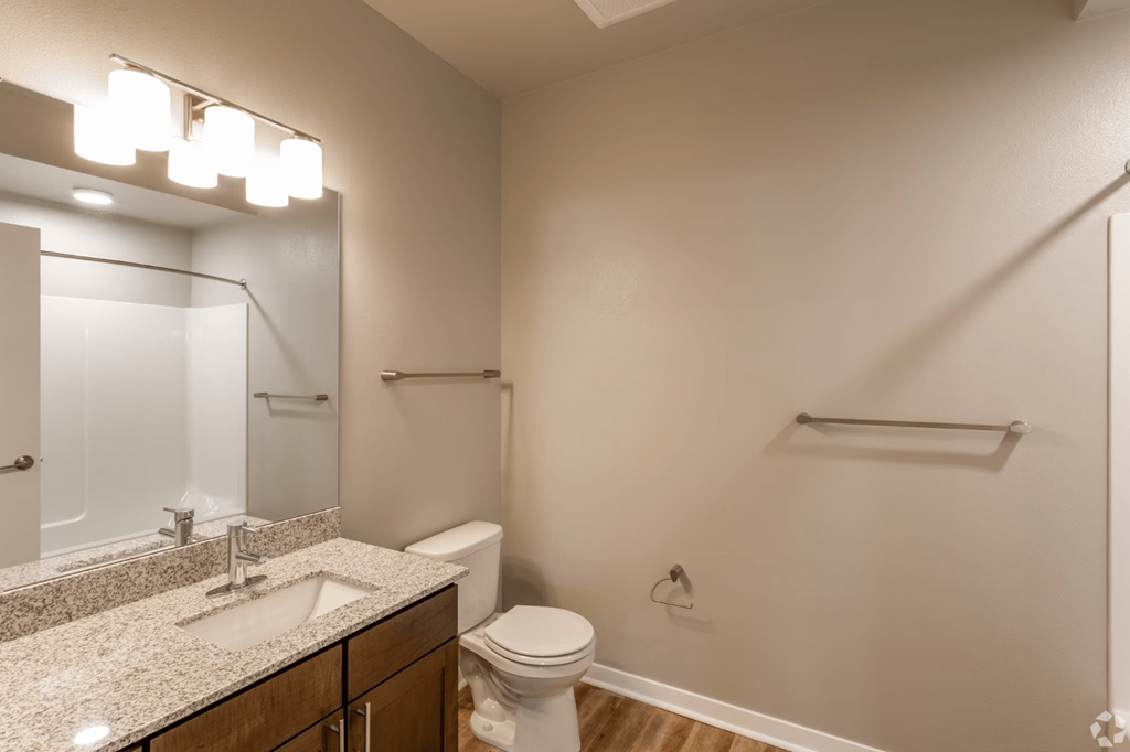 image of bathroom with single sink and toilet