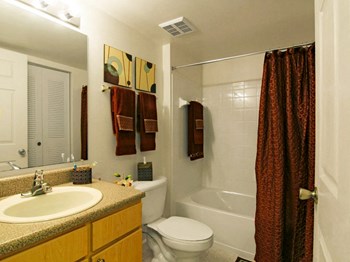 San Marco apartment home bathroom with vanity and tub and shower combo - Photo Gallery 15