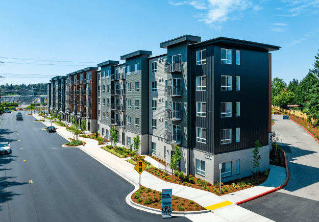 an aerial view of a large apartment complex with a road in front of it at STATION BY VINTAGE, COVINGTON Washington