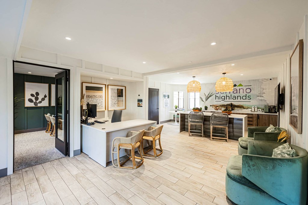a living room with a kitchen and a dining room