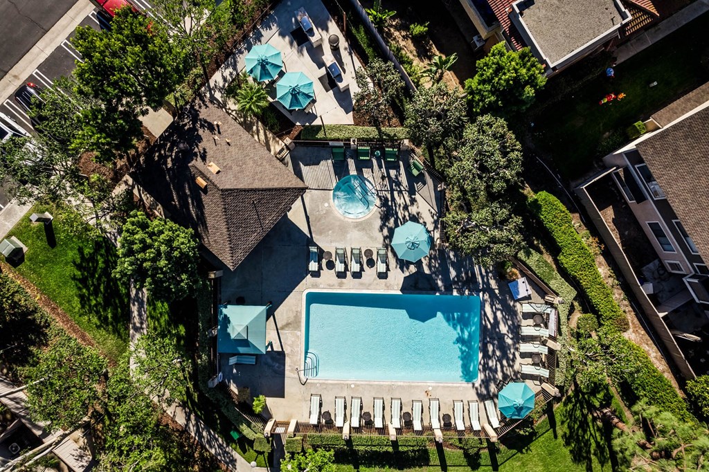 a view of the pool from above  the pool is surrounded