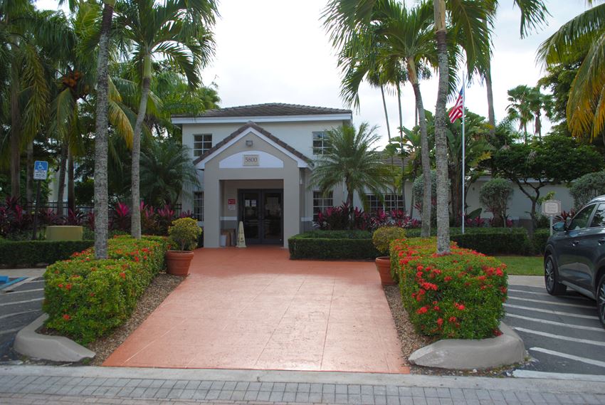 Siesta Pointe exterior entrance to leasing office - Photo Gallery 1