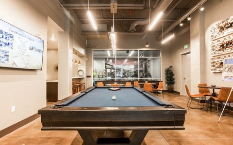 play a game of pool on the pool table in our game room