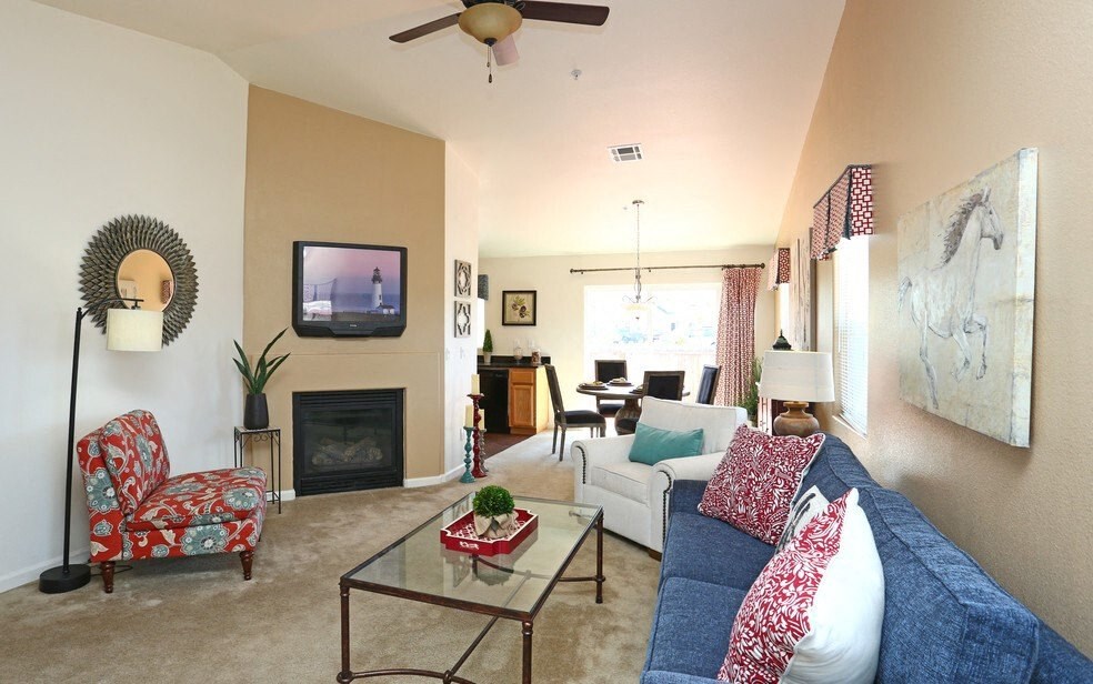 a living room with a couch and a table