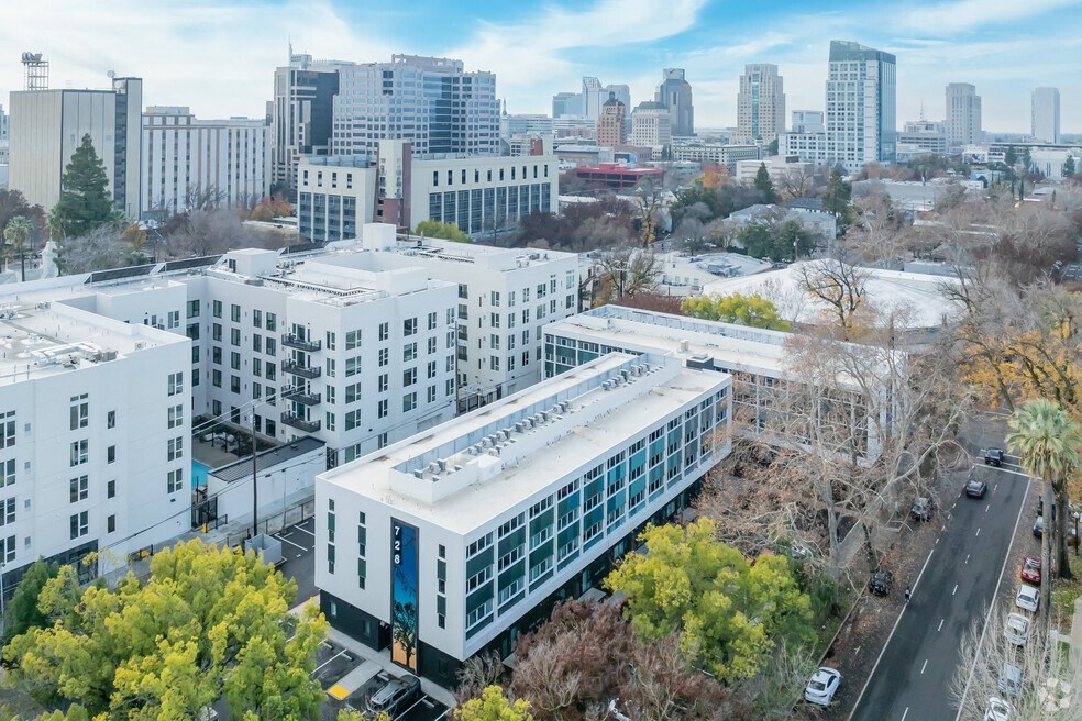 Downtown Sacramento, CA Apartments for Rent - Mod at Midtown - Aerial View of Property Exterior, with Surrounding Trees, Street, and City Views