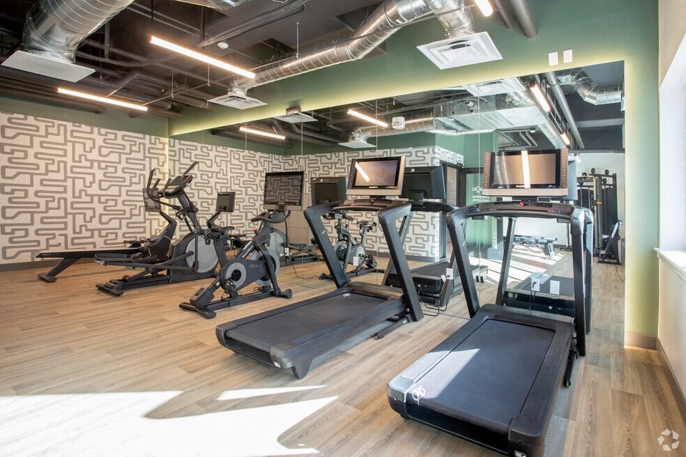 Studio Apartments in Downtown Sacramento, CA - Mod at Midtown - 24-Hour Fitness Center with Running Machines, Large Mirrors, and Plank Wood Flooring