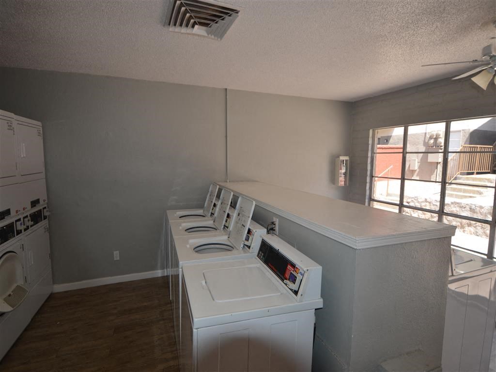 a white washer and dryer in a room at DESERT PEAKS, EL PASO, 79912