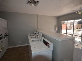 a white washer and dryer in a room at DESERT PEAKS, EL PASO, Texas