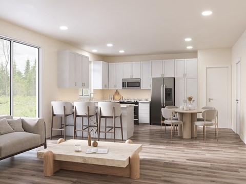 A modern kitchen with a dining table and chairs.