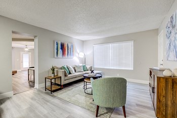Apartments for Rent in Fremont - Edge on the Boulevard - Large Window, Neutral Couch, Circle Table, and Wood-Style Floors - Photo Gallery 11