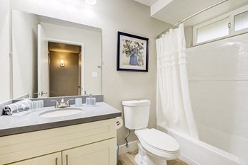 2 BR Apartments in Fremont CA - Edge on the Boulevard - White Bathroom with a Mirrored Vanity - Photo Gallery 13