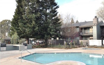 Apartments in Vacaville for Rent - The Parc- Gated Swimming Pool, Jacuzzi, and Grill Area - Photo Gallery 4