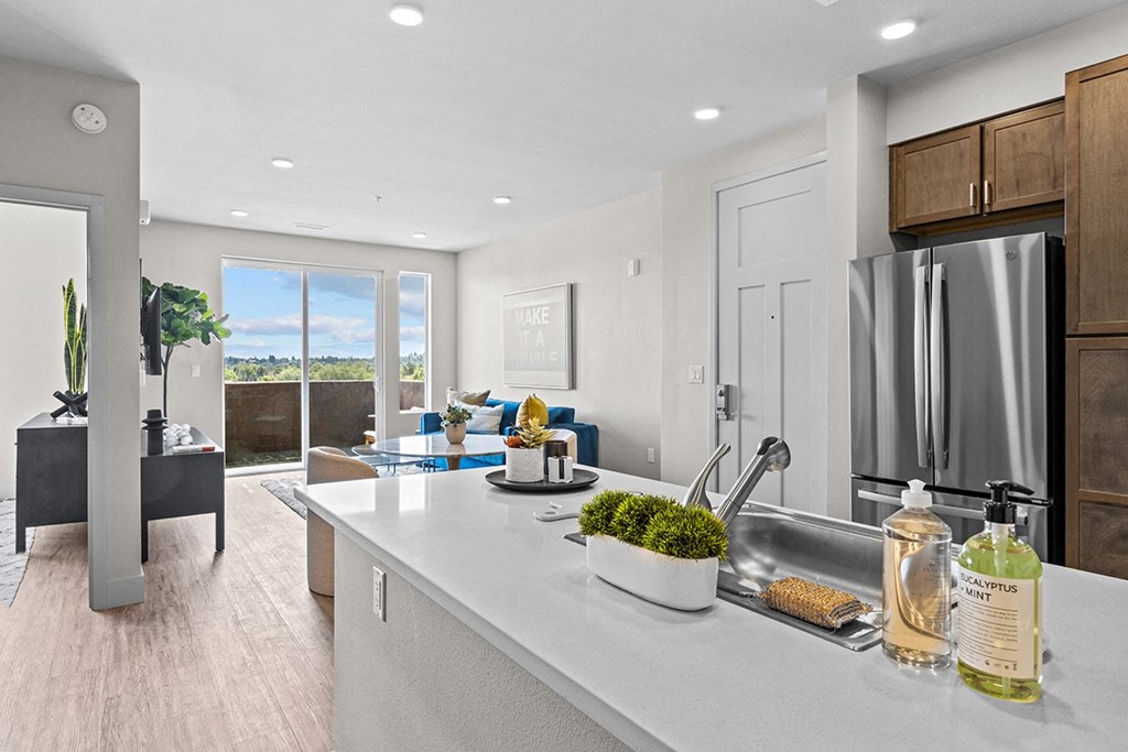 Kitchen with island near living room 