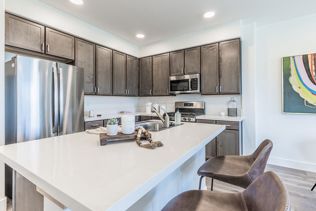 The Retreat open concept kitchen area with large island