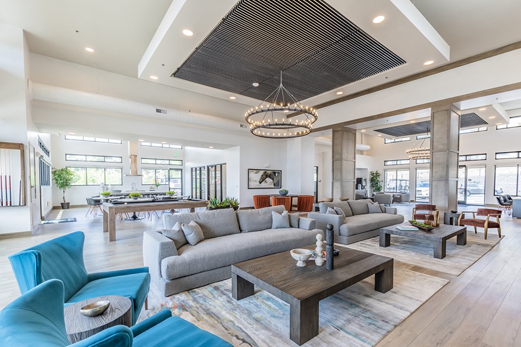 The Retreat clubhouse with lots of seating and high ceilings