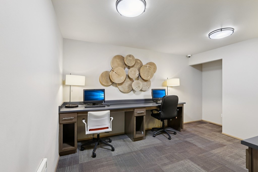 A modern office with two desks and computers  at The Timbers by Vintage, WA 98223