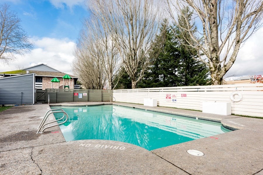 Apartments in Gresham OR - Township Eastside - Fenced-In Pool with Concrete Deck