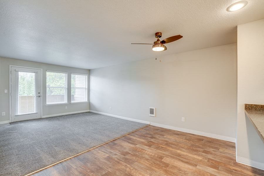 Dining and living room at TOWNSHIP Apartments, CANBY, OR