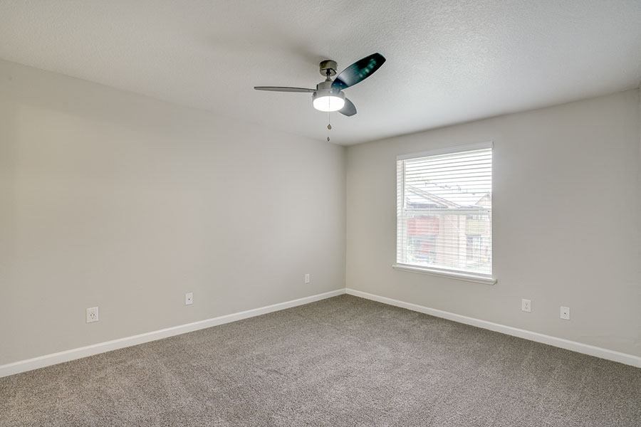 Room with window and carpet at TOWNSHIP Apartments, CANBY, OR