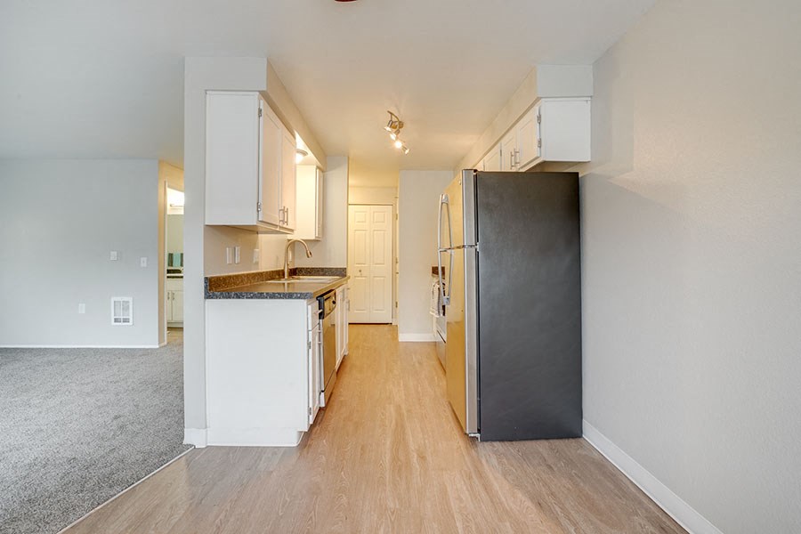Kitchen with appliances at TOWNSHIP Apartments, CANBY, Oregon