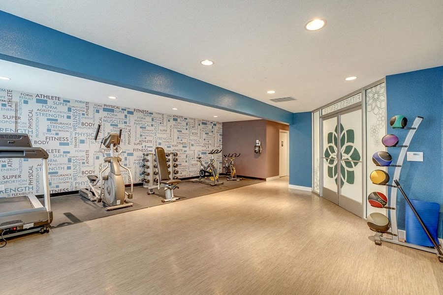 Gym with equipment at TOWNSHIP Apartments, Oregon