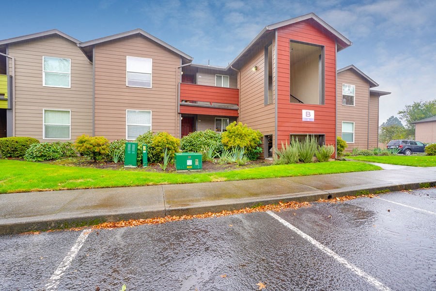 Exterior view of building with parking Exterior view of building with parking at TOWNSHIP Apartments, CANBY, Oregon