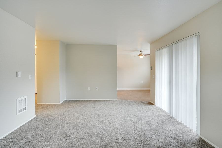 Living room near patio and kitchen at TOWNSHIP Apartments, Oregon