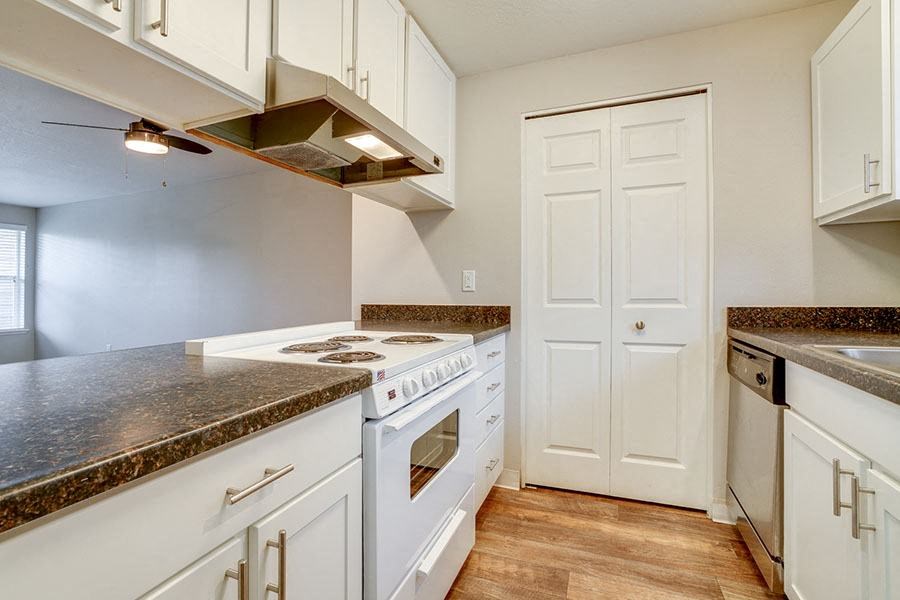 Kitchen view of stove area at TOWNSHIP Apartments, CANBY, OR