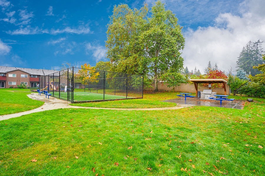 Grassy area near soccer field at TOWNSHIP Apartments, Oregon