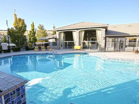 Sparks NV Apartments - High Rock 5300 - Relaxing Pool with Lounge Seating, Umbrellas, and Clubhouse