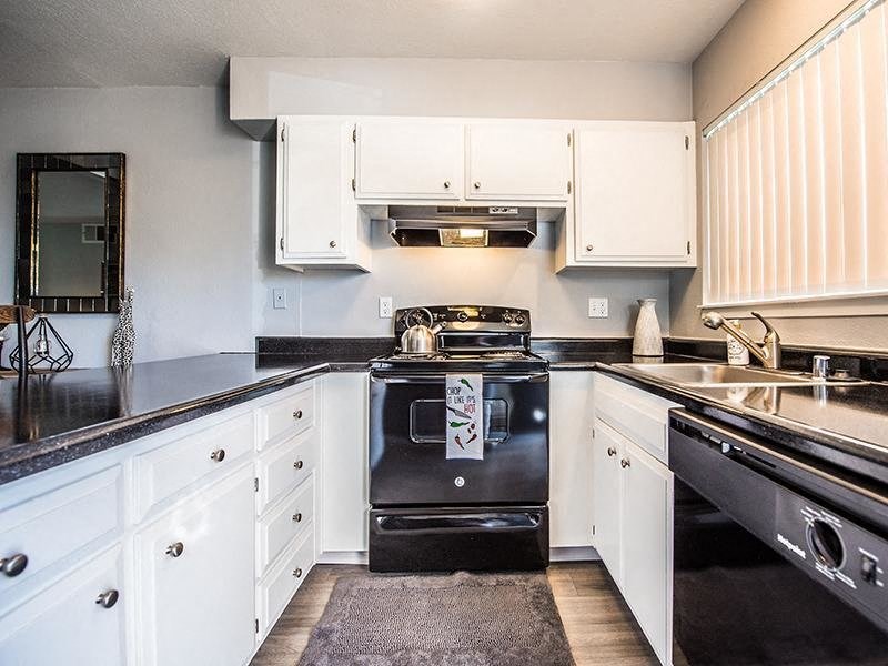The Eleven Hundred kitchen area with stainless steel appliances