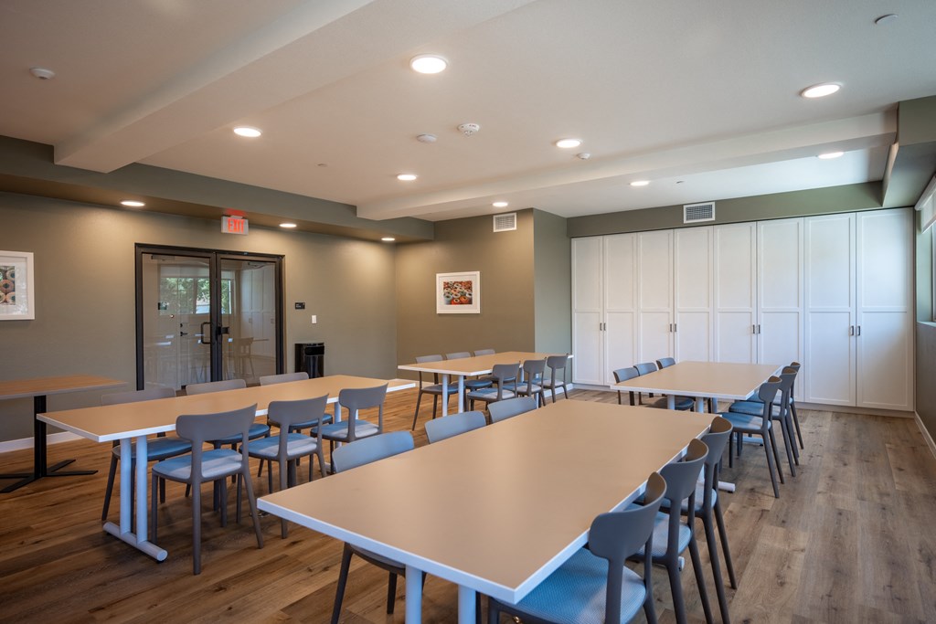 a multipurpose room with tables and chairs at Vintage at Anacapa Canyon, Camarillo, CA