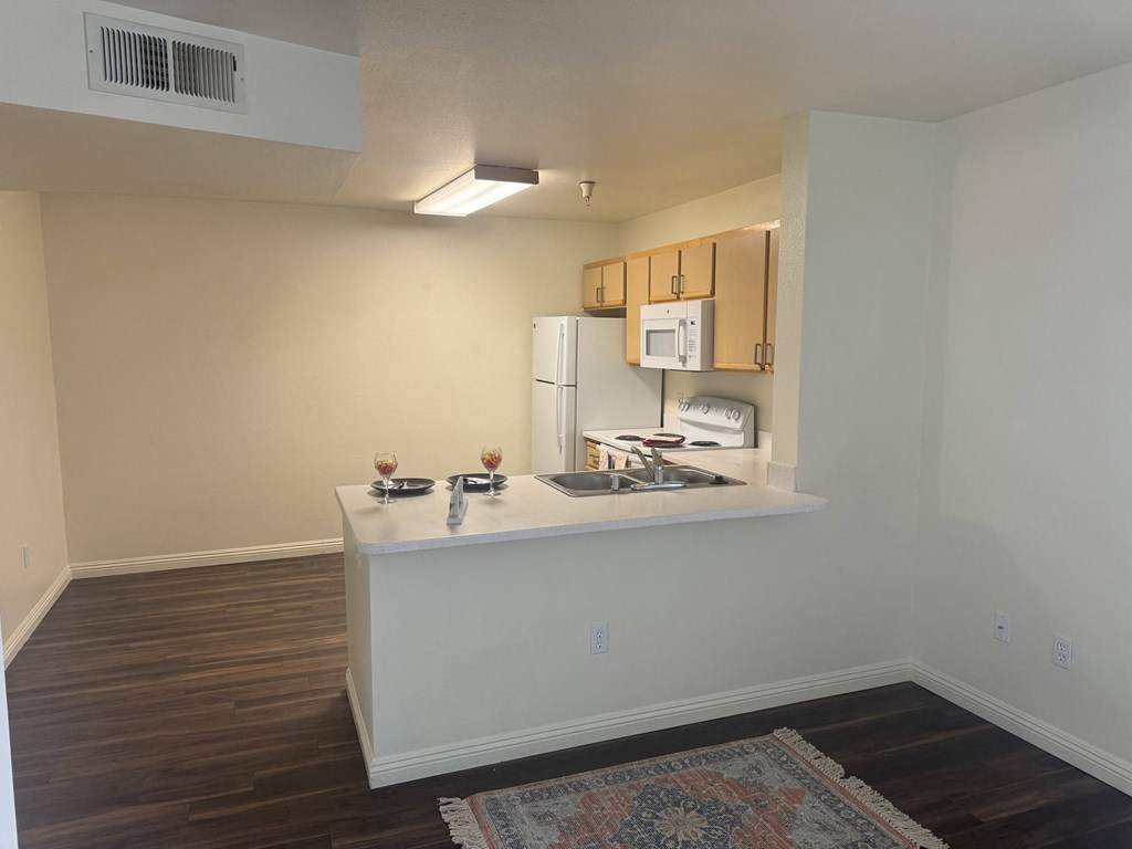 a view of a kitchen and a living room in an apartment at VINTAGE AT CITI VISTA, Reno, Nevada