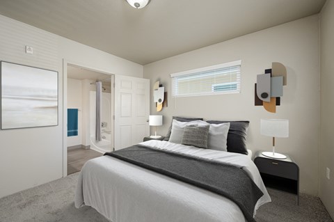 A bedroom with a large bed and a painting on the wall at VISTA CREEK Apartments, Nevada, 89029