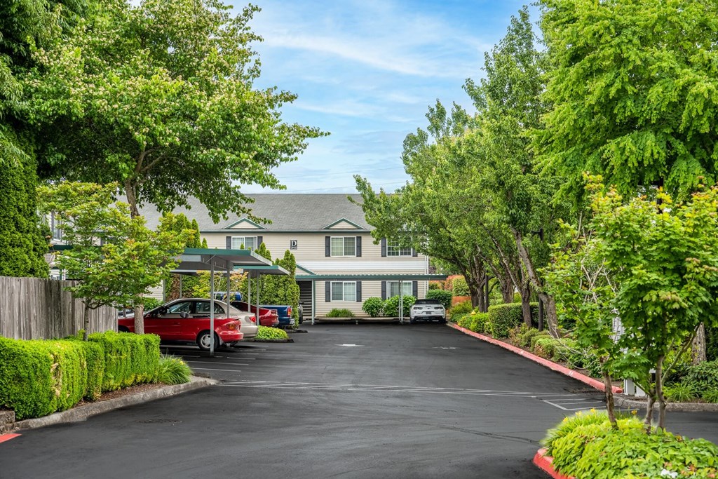 A parking lot in front of a building with cars parked.at Vancouver Mall Apartments, Vancouver, WA ? 