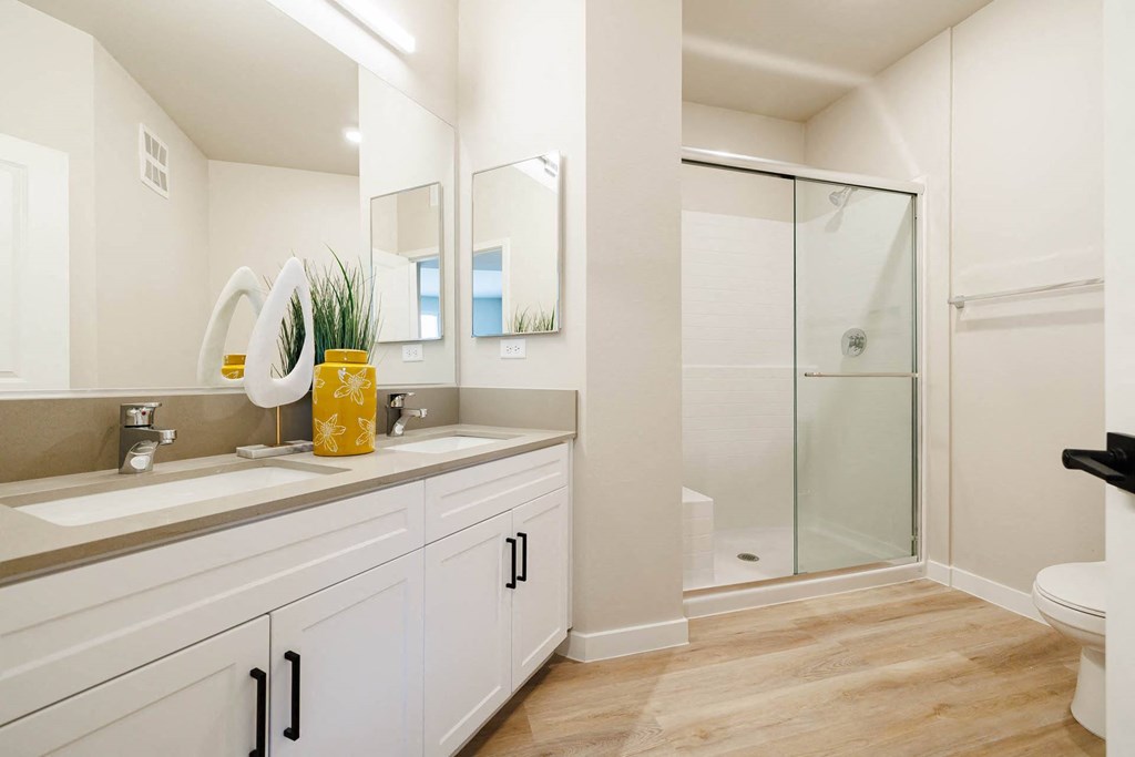 a bathroom with a sink and a shower at BASE APARTMENT HOMES, LAS VEGAS