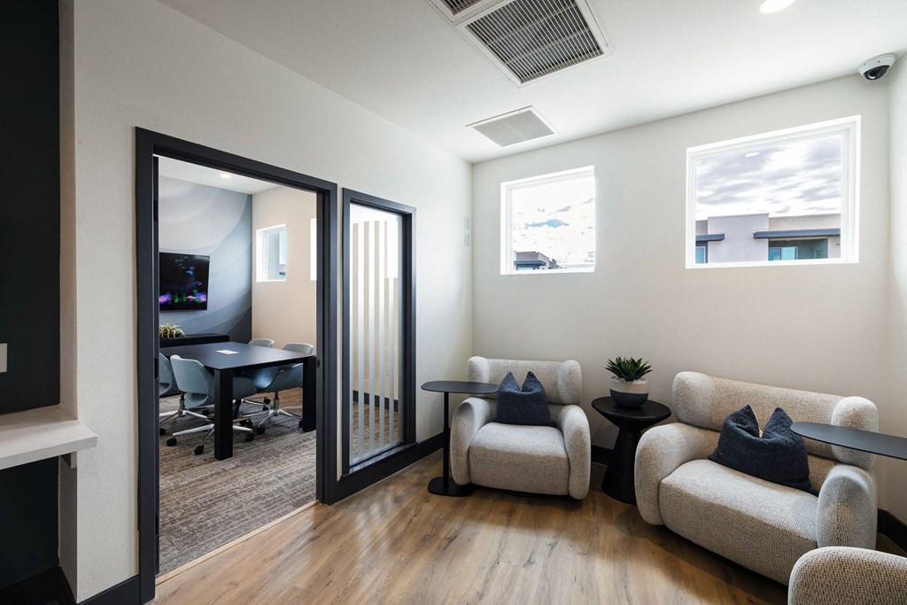 a living room with couches and chairs and a sliding glass door at BASE APARTMENT HOMES, LAS VEGAS, Nevada