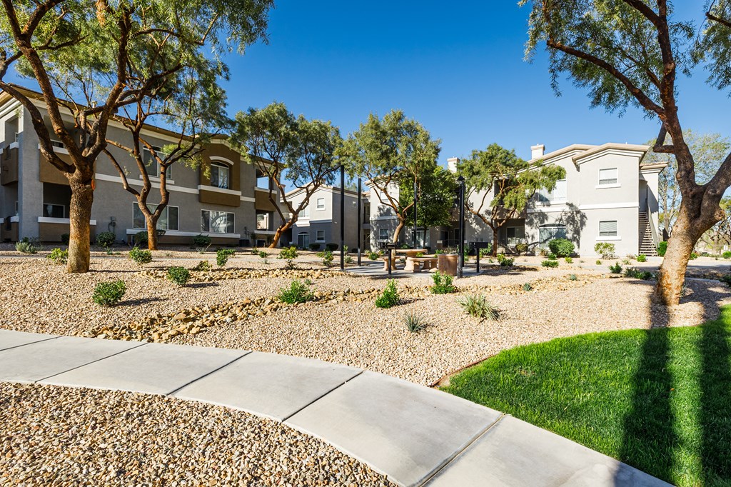 A residential area with houses and trees.