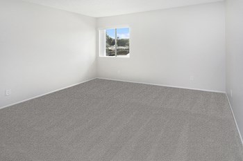 Bedroom with carpet and window - Photo Gallery 5