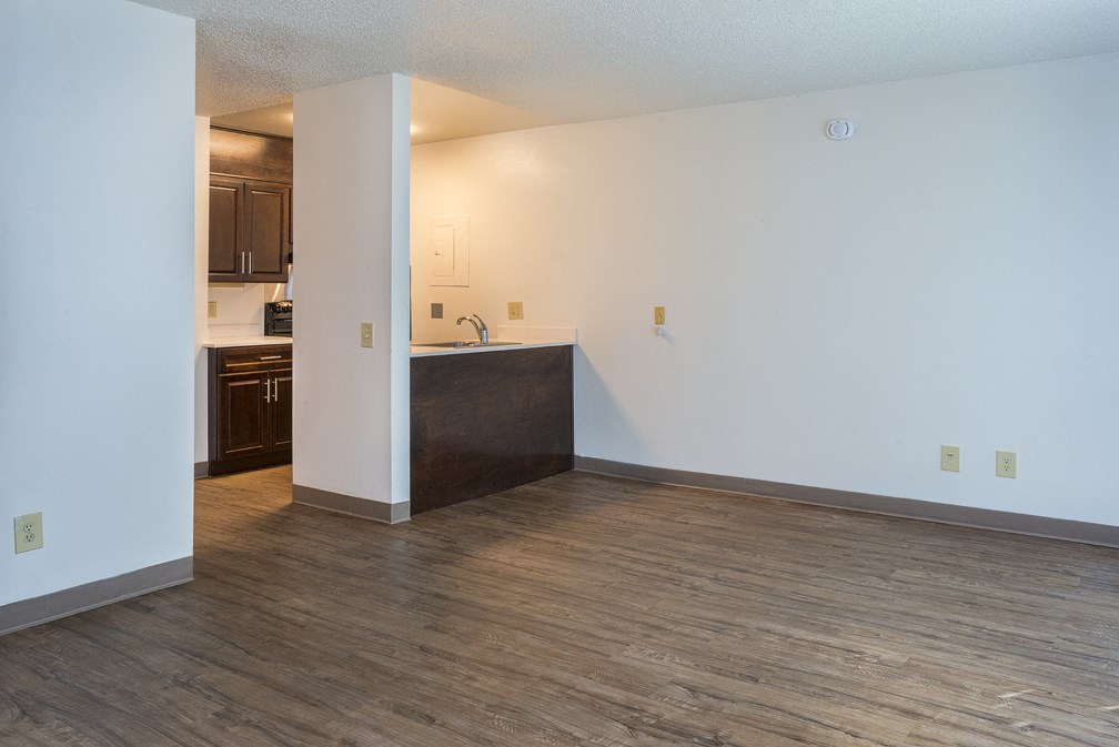 Kitchen and living area at MIRACLE TERRACE Apartments, Anaheim, California