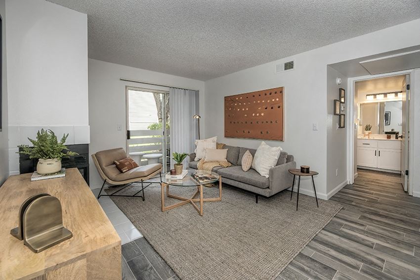 Apartments in Citurs Heights CA - The Arlo in Citrus Heights - Living Room with Wood-Style Flooring and Access to the Patio/Balcony - Photo Gallery