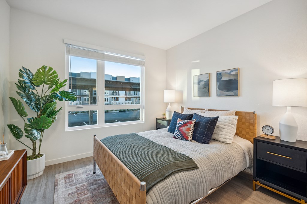 a bedroom with a bed and a large window at 38° NORTH, California, 95404