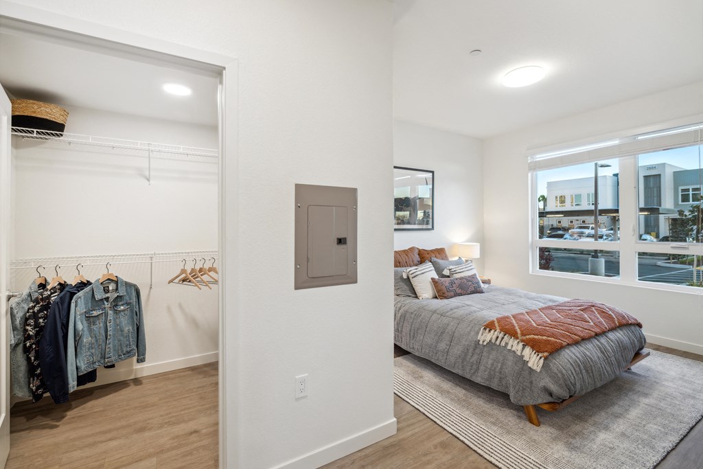 a bedroom with a bed and a closet at 38° NORTH, Santa Rosa, CA