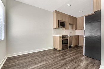 Updated kitchens with stainless steel appliances and new cabinetry - Photo Gallery 6