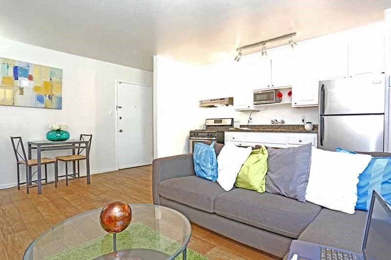 Kitchen and living room l Academy Lane Apartments in Davis CA 